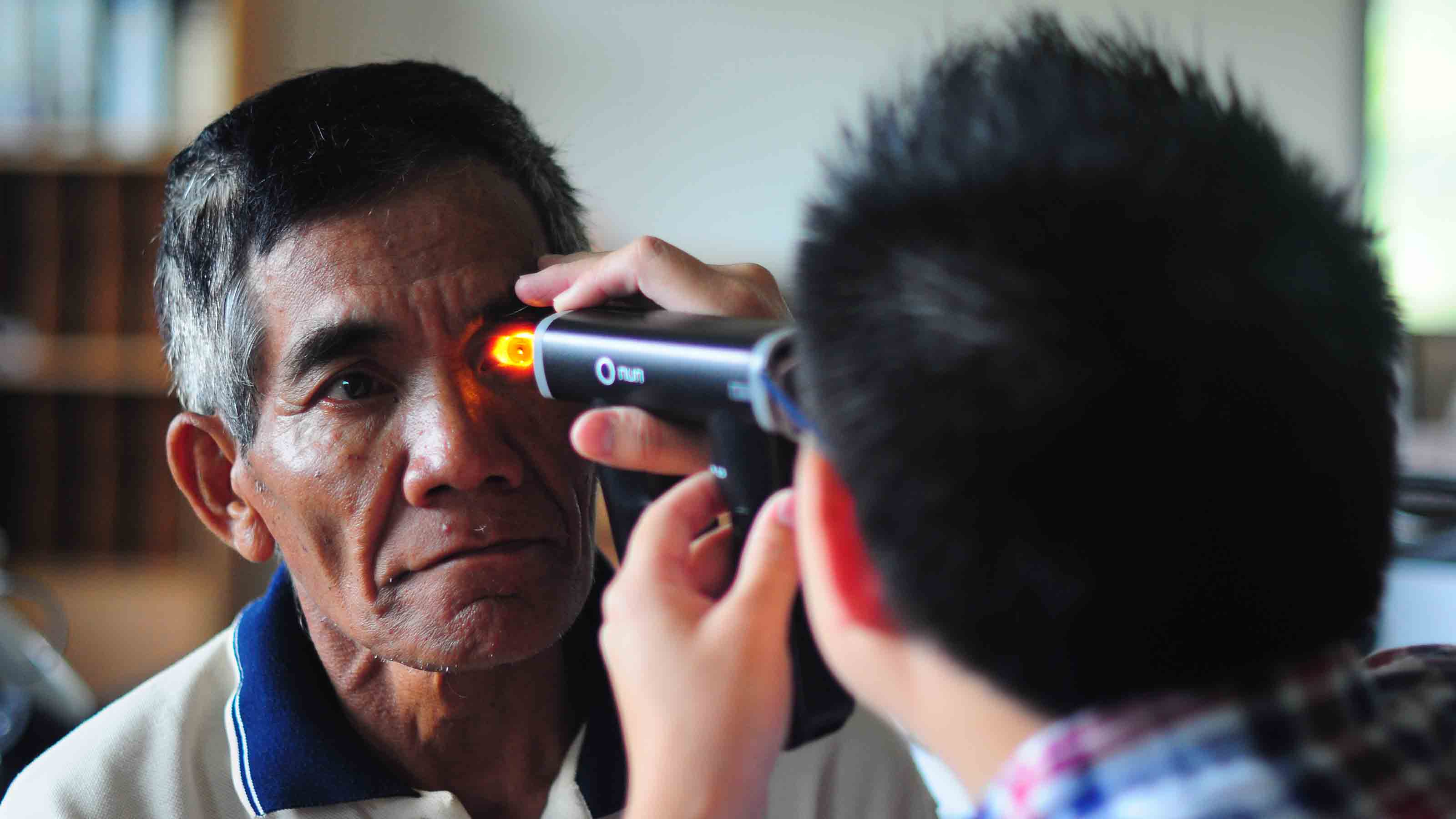 Man getting his eye checked