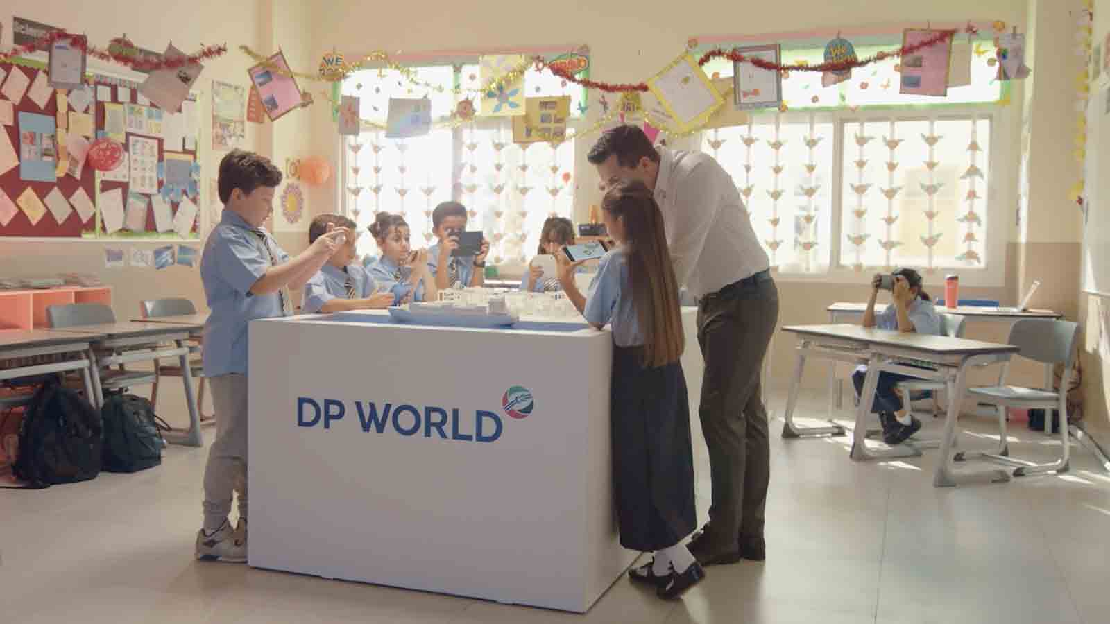 Children at DP World kiosk